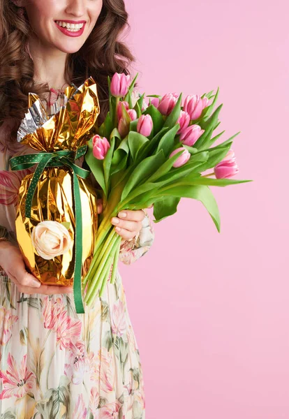 Closeup Woman Tulips Bouquet Golden Easter Egg Isolated Pink Background — Stok fotoğraf