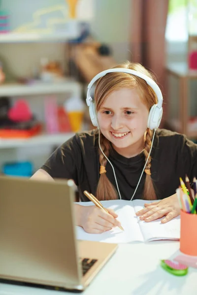 Smiling Modern School Girl Grey Shirt Laptop Headphones Workbook Having — ストック写真