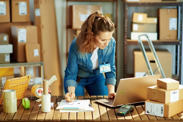 Delivery Business Young Female Jeans Laptop Warehouse — Stok fotoğraf