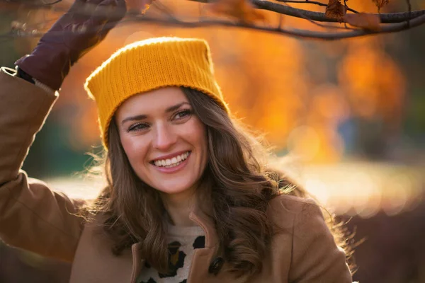 Hello October Smiling Modern Woman Brown Coat Yellow Hat Outdoors — ストック写真