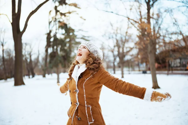 Happy Elegant Woman Mittens Knitted Hat Sheepskin Coat Rejoicing Outdoors — Stok Foto