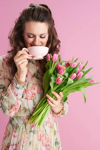 Happy Middle Aged Woman Floral Dress Tulips Bouquet Cup Tea — Foto de Stock