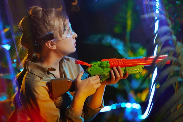 Stylish Girl Toy Gun Futuristic Glasses Metaverse — Stockfoto