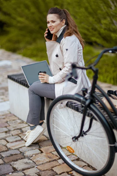 Happy Stylish Woman Beige Trench Coat Bicycle Cup Cappuccino Speaking — Stockfoto