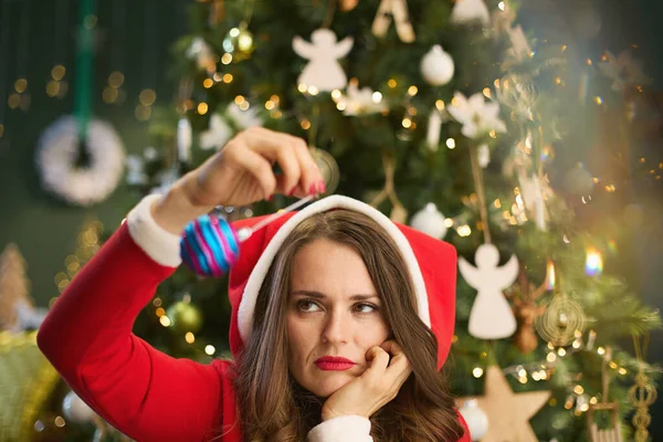 Christmas Time Tired Stylish Woman Santa Hat Hypnotizes Herself Christmas — Stockfoto