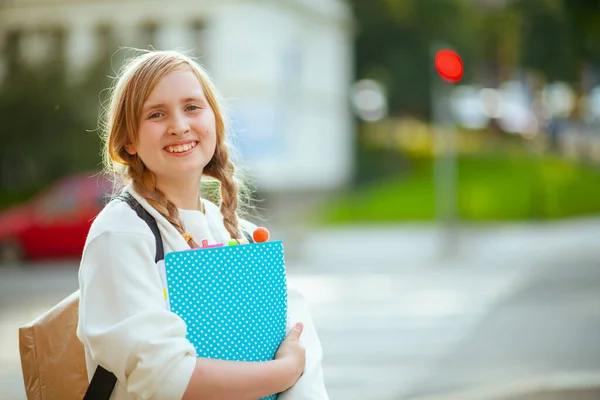 Portrait Smiling Stylish Girl White Sweatshirt Workbook Backpack Crossing Crosswalk — Φωτογραφία Αρχείου