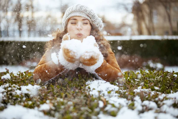 Happy Elegant Woman Mittens Knitted Hat Sheepskin Coat Blowing Snow —  Fotos de Stock