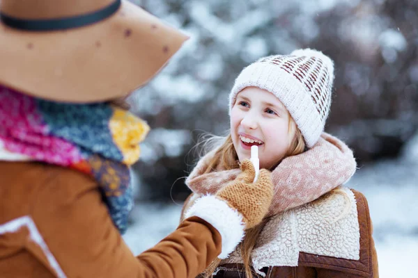 Smiling Modern Mother Child Hats Sheepskin Coats Mittens Using Hygienic — Stock Photo, Image