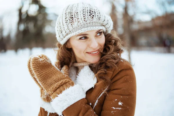 Smiling Stylish Middle Aged Woman Mittens Knitted Hat Sheepskin Coat — Stockfoto