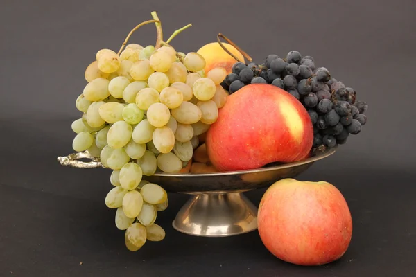 Autumn fruits in a dish — Stock Photo, Image