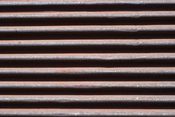 Oude roestige roller sluiter close-up — Stockfoto