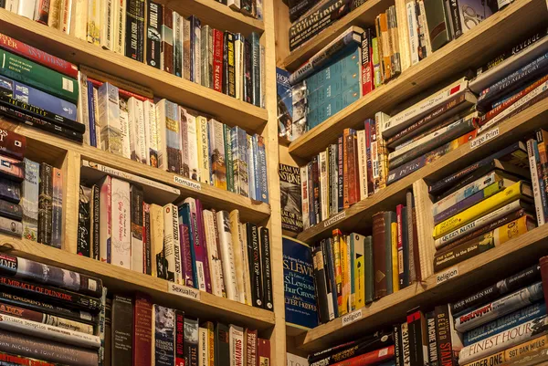 Secondhand bookstore shelves corner — Stock Photo, Image