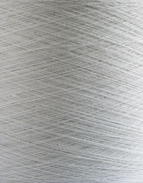 Natural linen yarn bobbin closeup — Stock Photo, Image