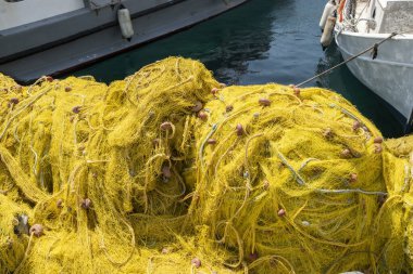 Pile of fishing net closeup on pier