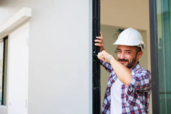 Man Installing Windows New House Construction Site Hispanic Construction Worker — Foto de Stock