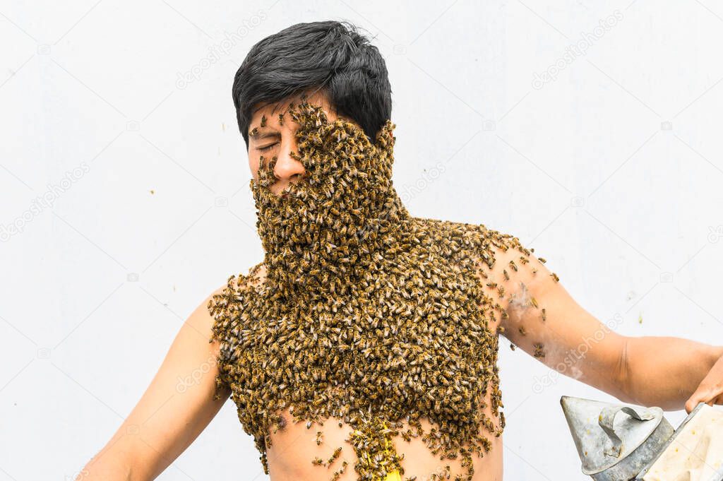 Beekeeper covered by bees, he has the queen bee on his neck so all the bees stick to his body. surrealism.