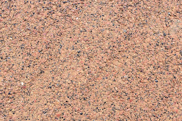 Superfície Composta Por Textura Pequenas Pedras Sobre Fundo Laranja — Fotografia de Stock