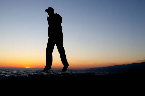 Silhouette Man Jump Coastline Sea Evening — Stock Photo, Image