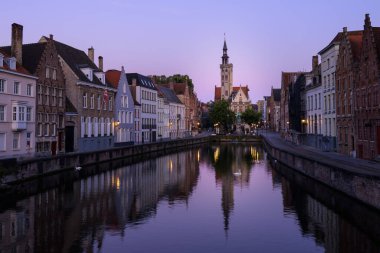 Brugge, Belgium - July 4, 2022: Langerei canal at dawn in summer
