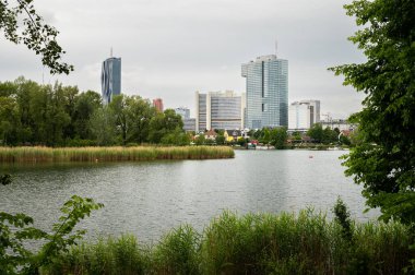 Vienna, Austria - June 5, 2020: Skyline of the high buildings in 22nd district of Vienna, Austria as seen from alte Donau