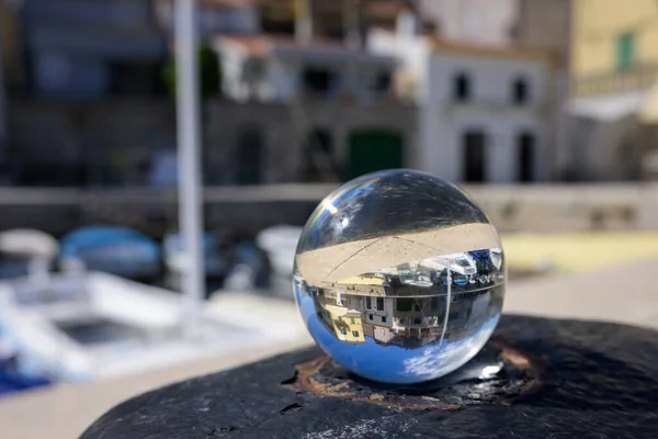 Glass Sphere Lying Rusty Bollard Harbor Valun Croatia Sunny Day —  Fotos de Stock