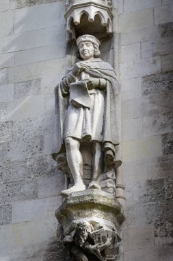 Small statue of the Burghers Lodge in Bruges (Belgium), sunny day in summer