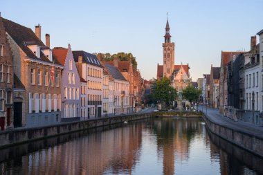 Brugge, Belgium - July 4, 2022: Langerei canal at dawn in summer