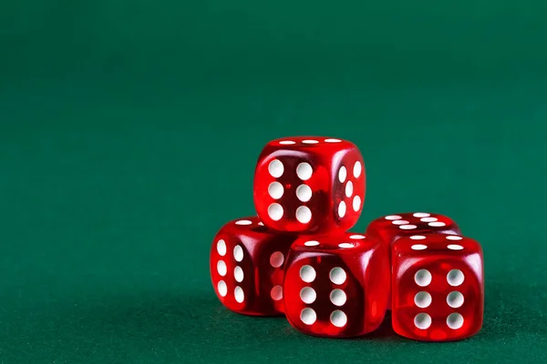 Dices on the green cloth. — Stock Photo, Image