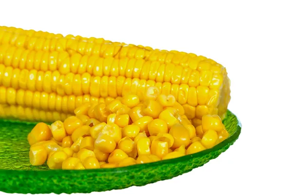 Corns on green plate — Stock Photo, Image