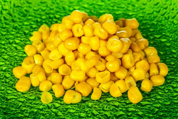 Corn on green plate — Stock Photo, Image