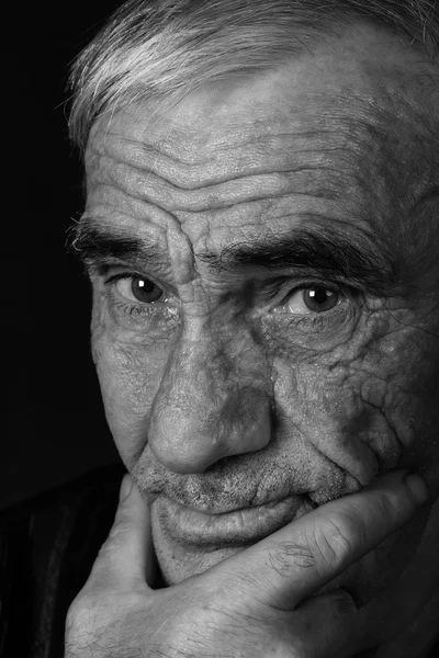 Monochrome portrait of an elderly man — Stock Photo, Image