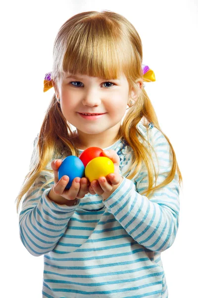 黄色の復活祭の卵と一緒に甘い少女 ロイヤリティフリーのストック写真