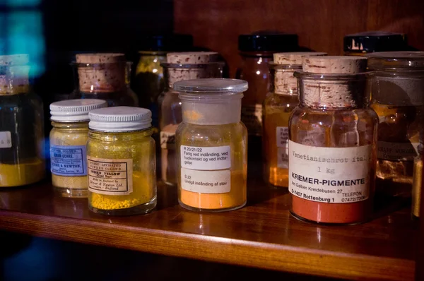 Historical painting pigments in vintage bottles — Stock Photo, Image