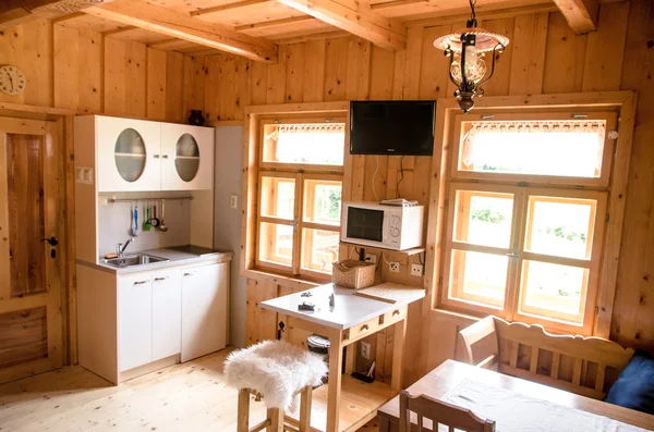 Wooden log cottage cozy interior — Stock Photo, Image