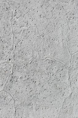 Gri beton duvar dokusunun dikey fotoğrafı. Harika bir arka plan