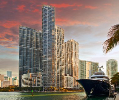 Miami Florida business and residential buildings at sunset clipart
