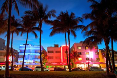 Miami Beach Florida hotels and restaurants at sunset clipart