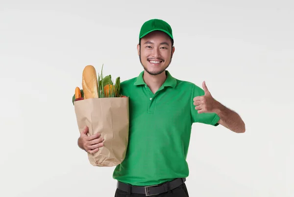 Asian Delivery Man Wearing Green Uniform Holding Fresh Food Paper — Photo