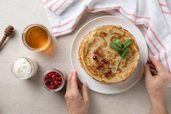 Woman Serves Thin Pancakes Dining Table Shrove Tuesday Top View — Stock Photo, Image