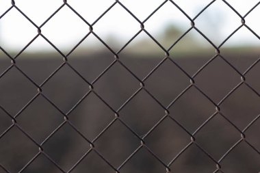 Kırsal bir çiftlikte çit, yakın çekimde çit. 