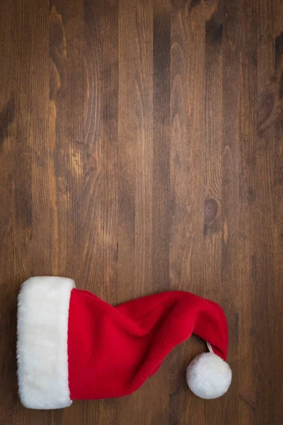 클로스는 배경에 모자를 크리스마스 — 스톡 사진
