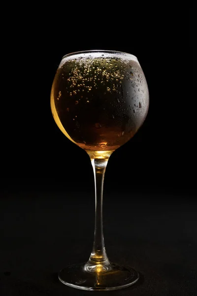 Dark beer in a glass close-up, beer in a pub