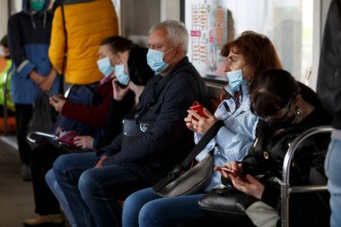 06.03.2020, Kyiv, Ukraine, people in protective masks in the subway cars. pandemic Coronavirus infection (COVID-19)