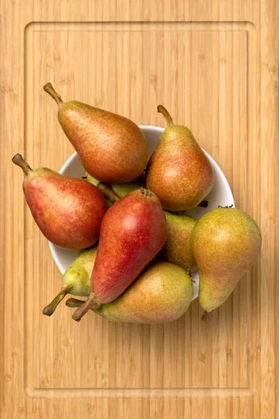 Ripe Juicy Pears Bowl Wooden Background Top View — Foto Stock