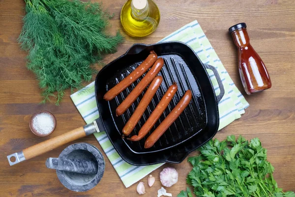 Hot Dog Sausages Fried Grill Pan Top View Greens Spices — Stok fotoğraf