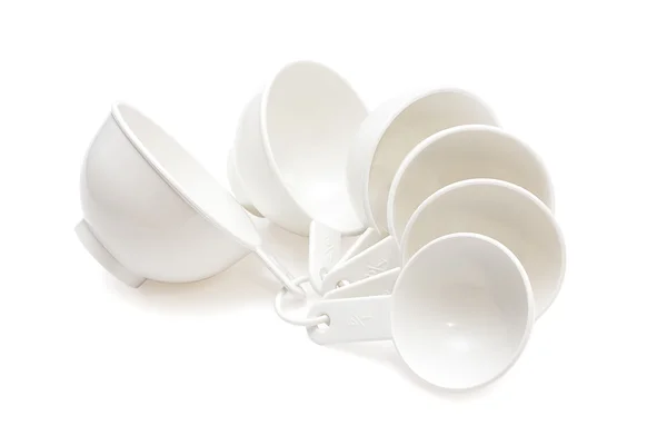 Measuring cups on white — Stock Photo, Image