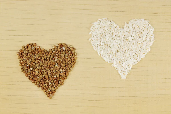 Rice and buckwheat as heart — Stock Photo, Image