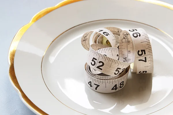 Centímetro blanco en chinaware blanco — Foto de Stock