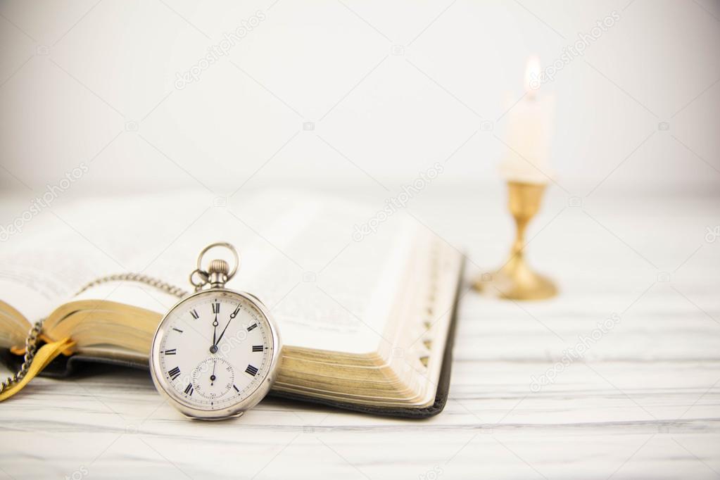 The Bible opened and pocket watch — Stock Photo © Daniilantiq #45686863