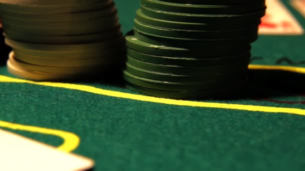 Chips with cards on a poker table — Stock Video